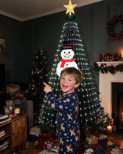 Child excited by the snowman picture on the tree